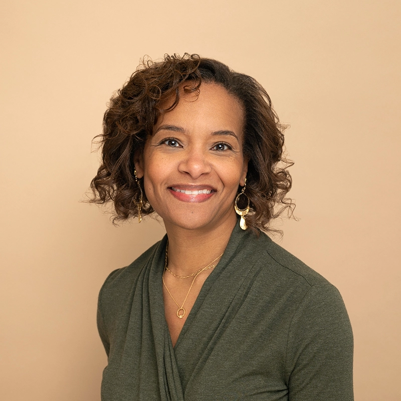 A photo of Terri Walker, a female Bible study author and founder of A Yielded Heart.